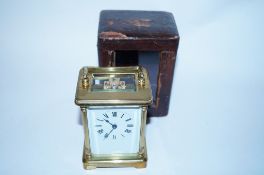 A fine 19th century english carriage clock with orginal carry case and key