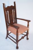 A finely carved 19th century oak armchair