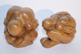 Two carved wooden figures