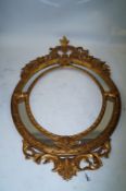 A large French heavy gilt mirror, probably French