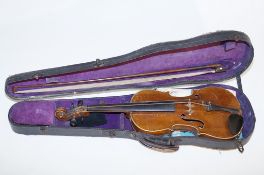 A cased student Violin