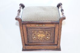 A Victorian magazine rack and stool with scroll handle