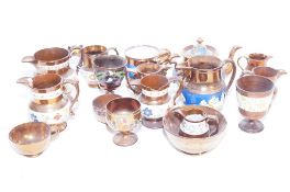 A good collection of 19th century copper lustreware items, including a teapot, cream/milk jugs and