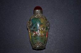 An oriental decorated glass scent bottle