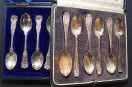 Two sets of cased silver tea spoons