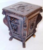 A finely carved oak 19th century coal bin