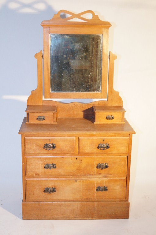 An pine art nouveau dressing table, with a mirrored top