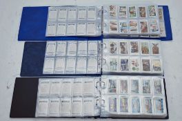 Three Albums of cigarette cards, full sets.