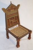 An Indian carved chair