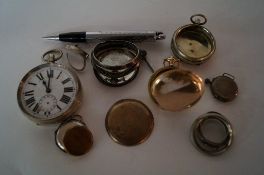 A collection of silver plated watches and other related items