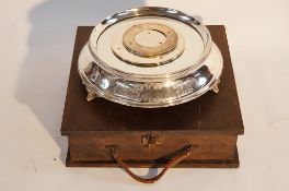 Silver plated cake stand in an oak case