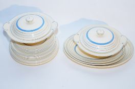 A collection of Clarice Cliff service ware, including tureens etc.