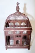 A wooden bird cage