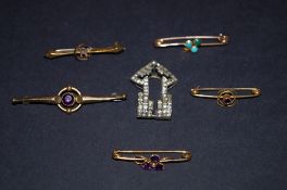 Five bar brooches and one lapel clip