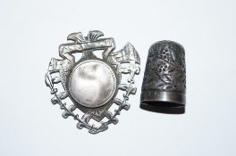 Silver thimble, silver badge and art nouveau badge