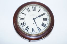 An early 20th century mahogany American wall clock