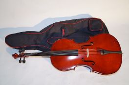 A Chinese modern cased Cello and bow, full size.