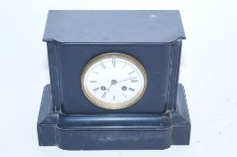 A black early 20th century slate clock