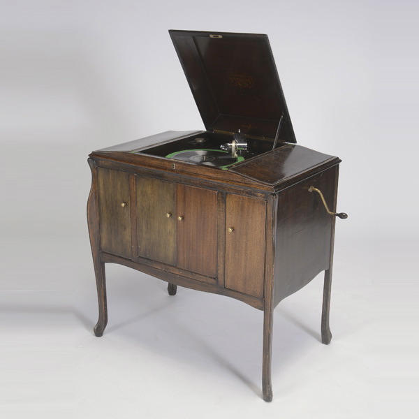 Sherman and Clay Phonograph, in oak four door console, with records {Dimensions 35 x 33 1/2 x 20