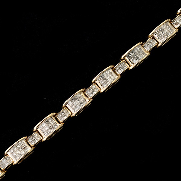 DIAMOND, 14K YELLOW GOLD BRACELET. Featuring two hundred and thirty-four princess-cut diamnds,