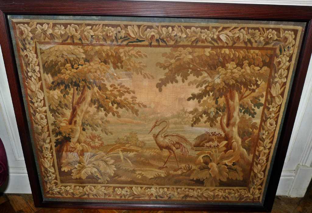 A large17th century Flemish verdure tapestry panel c.1650 depicting a Heron in a classical landscape