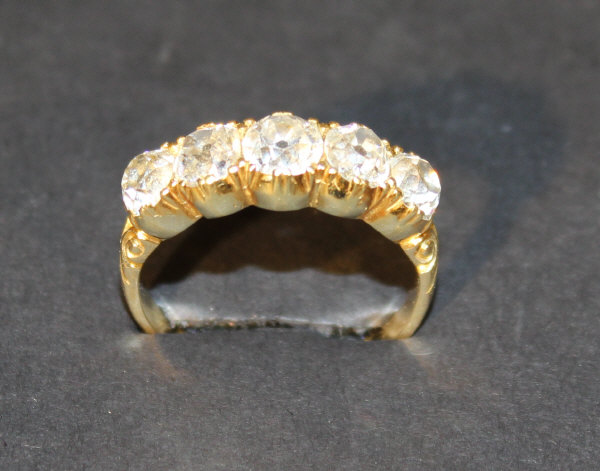 A gold mounted five stone diamond ring, approx. 2.2 carats total, size V