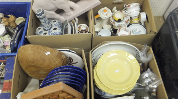 Four boxes of assorted household and decorative chinawares to include teacups and saucers, bowls,