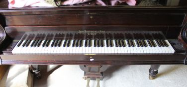 A late Victorian rosewood cased grand piano, the iron framed overstrung movement by John Broadwood &