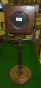 A 19th century mahogany and inlaid zograscope on adjustable pedestal and platform base