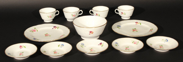 A 19th century Coalport porcelain twelve piece part tea service comprising two sandwich plates, five