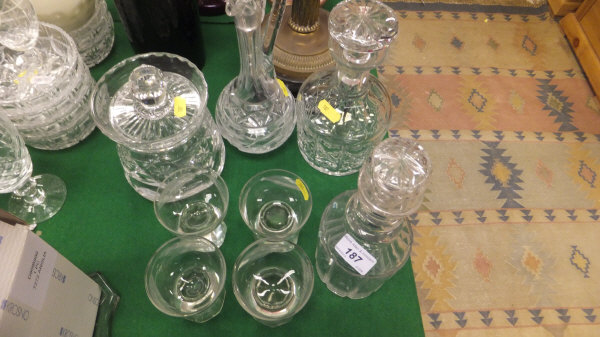 A late 19th / early 20th Century ring-necked mallet shaped decanter, a further cut glass decanter