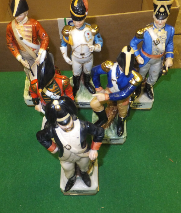 A set of six early 20th Century Continental porcelain military figures dressed in early 19th Century