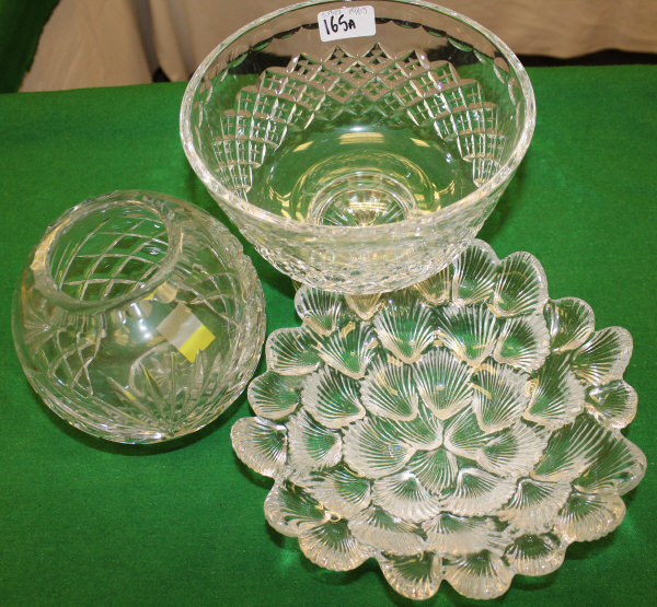 A cut glass pedestal bowl, a pressed glass shell dish, and a cut glass spherical bowl (3)