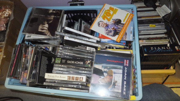 Three boxes of assorted CDs etc, to include Emi Lou Harris, Willie Nelson, Dire Straits and Mark