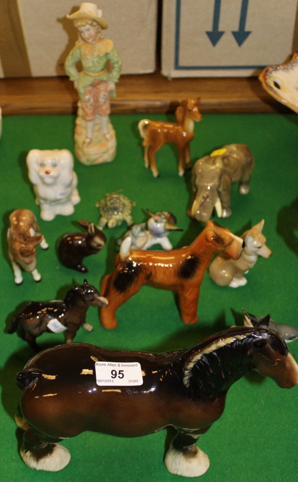 A Royal Doulton pottery figure of a shire horse, a Beswick pottery Shetland foal, a Beswick