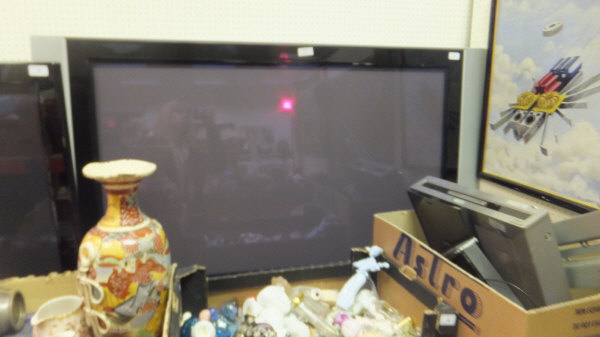 A Philips flat screen television, together with a Sony DVD Writeable Recorder, Freeview Box, etc.