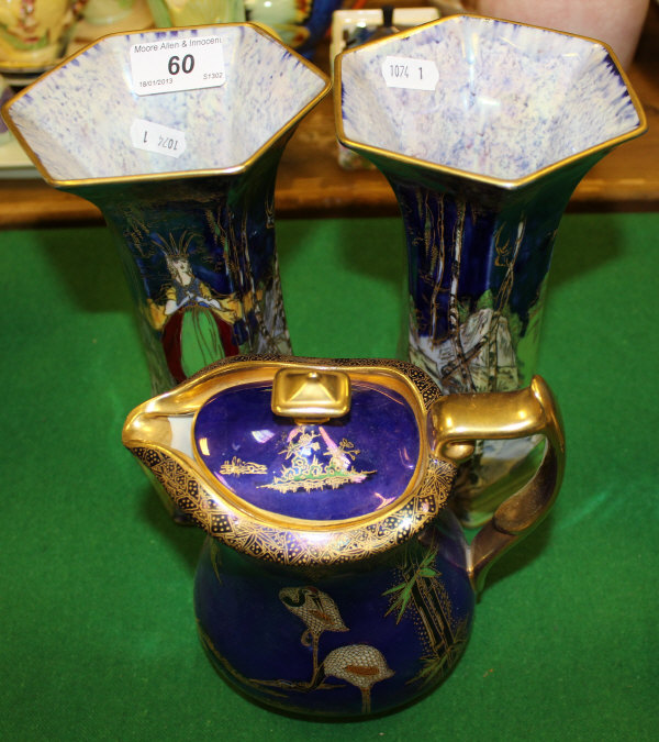 A pair of Wilton ware hexagonal fairy land lustre vases with gilt rims and blue mottled interiors