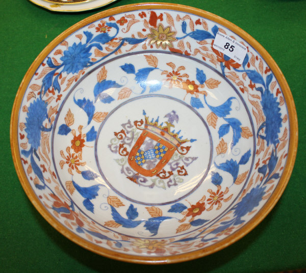 A 20th Century porcelain bowl decorated in the Imari palette with loose floral sprays and an