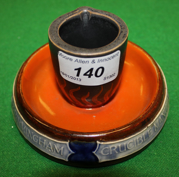 A Royal Doulton stoneware ash tray/match holder, the sides inscribed "Doulton & Co Ltd., London &