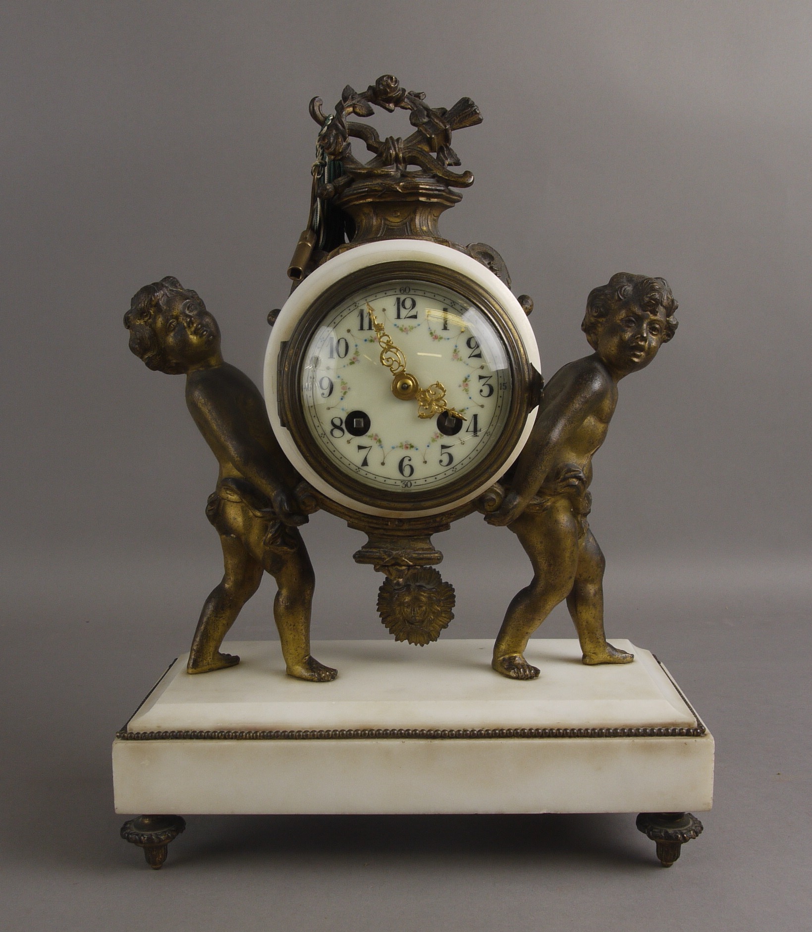 A LATE 19TH CENTURY FRENCH MANTEL CLOCK IN THE LOUIS XV MANNER, the Mougin cylinder movement with