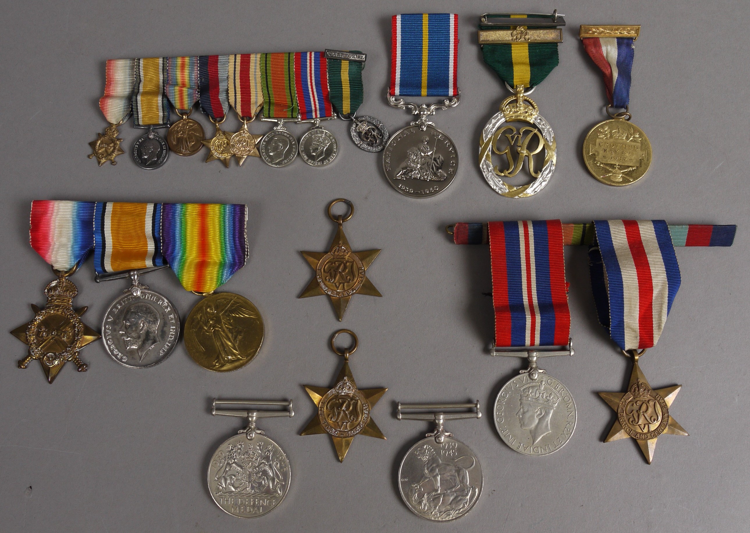 A GROUP OF THREE WWI CAMPAIGN MEDALS, to 2 Lieut. D. E. Adams, Middx. R.; together with a group of