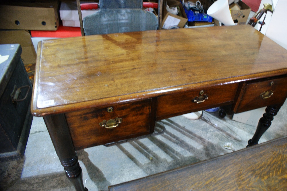 A Campaign Style Mahogany Writing Desk With Threaded Corner Supports