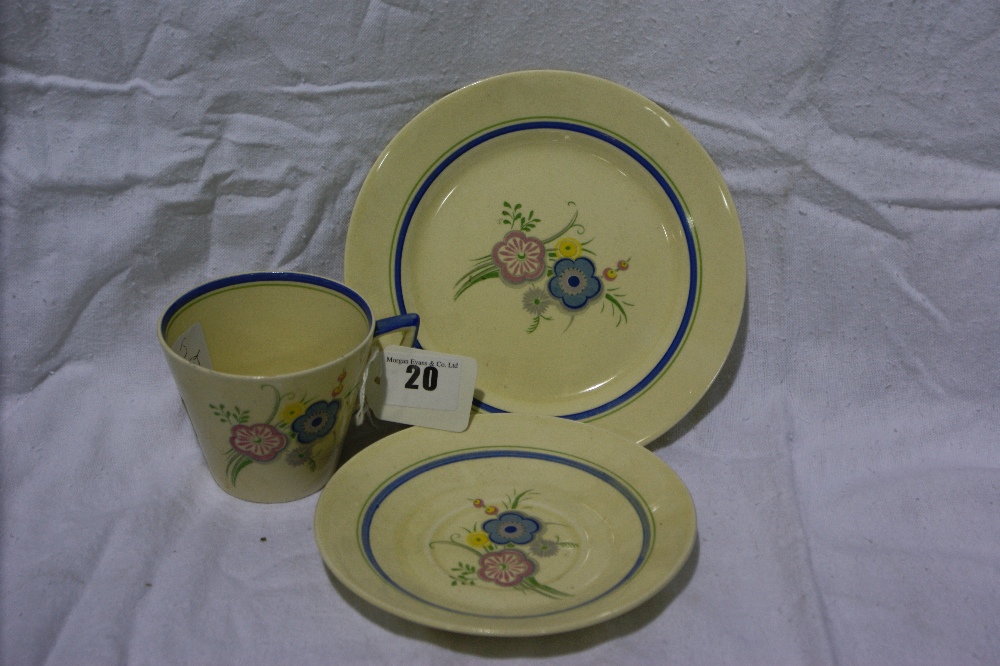 A Clarice Cliff Floral Decorated Trio