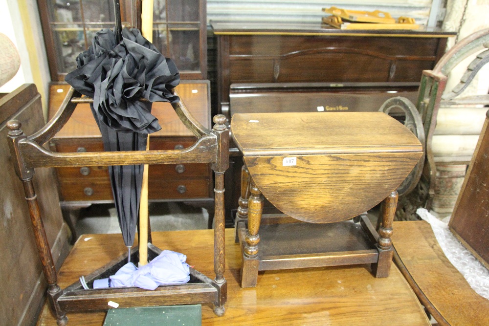 A Polished Corner Stick Stand Together With A Polished Oak Occasional Table