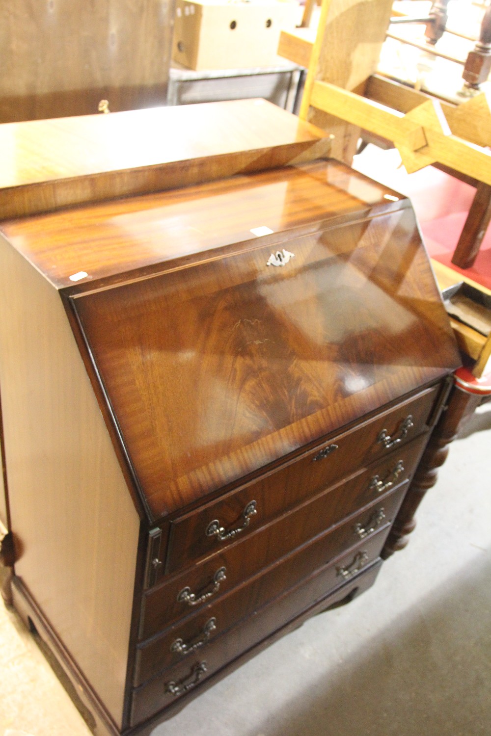 A Mid 20th Century Polished Mahogany Bureau