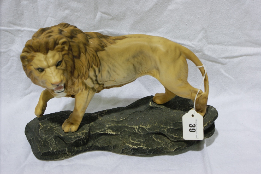 A Beswick Model Of A Lion On A Rock By Graham Tongue, Matt Finish, Model Number 2554a