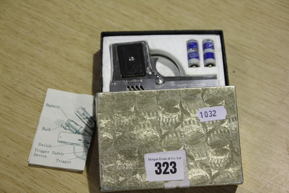 A Boxed "Aurora 45" Pistol Type Gas Lighter With Flash Light