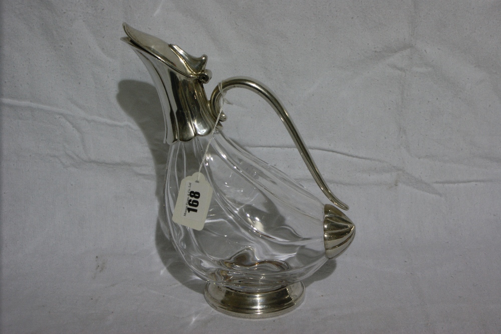 A 20th Century Claret Jug With Plated Mounts