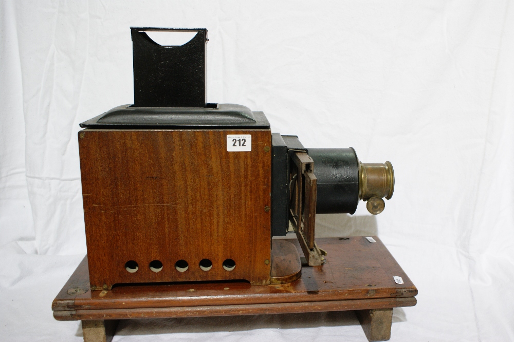 A Mahogany And Tin Ware Magic Lantern Together With A Selection Of Mainly Topographical Slides
