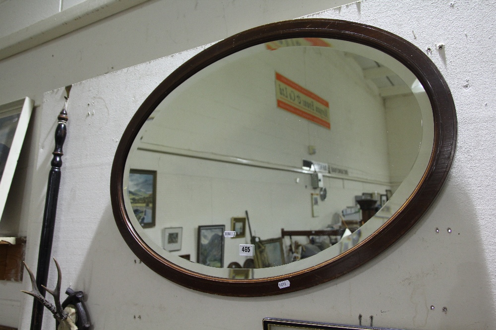 An Oval Wall Mirror